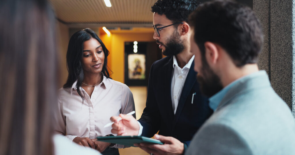Recruiter using a talent rediscovery AI agent to surface past applicants in an ATS
